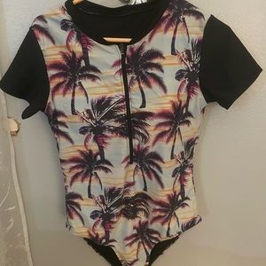 Rash guard one piece short sleeve bathing suit.